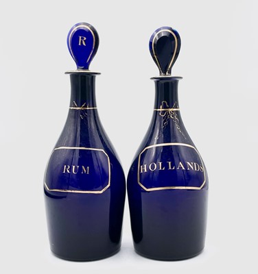 Lot 1017 - Two Georgian Bristol blue decanters with...