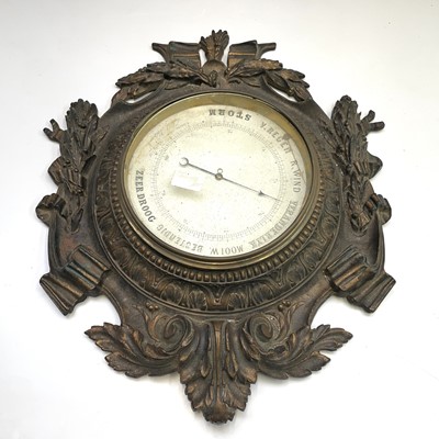 Lot 320 - A Dutch aneroid barometer.