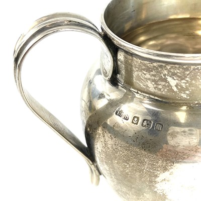 Lot 183 - A George V silver ovoid cream jug, Birmingham...