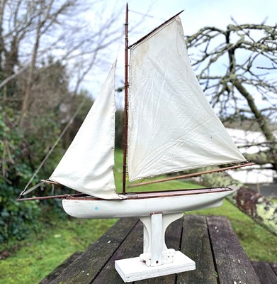 Lot 182 - A large wood pond yacht with a weighted keel,...