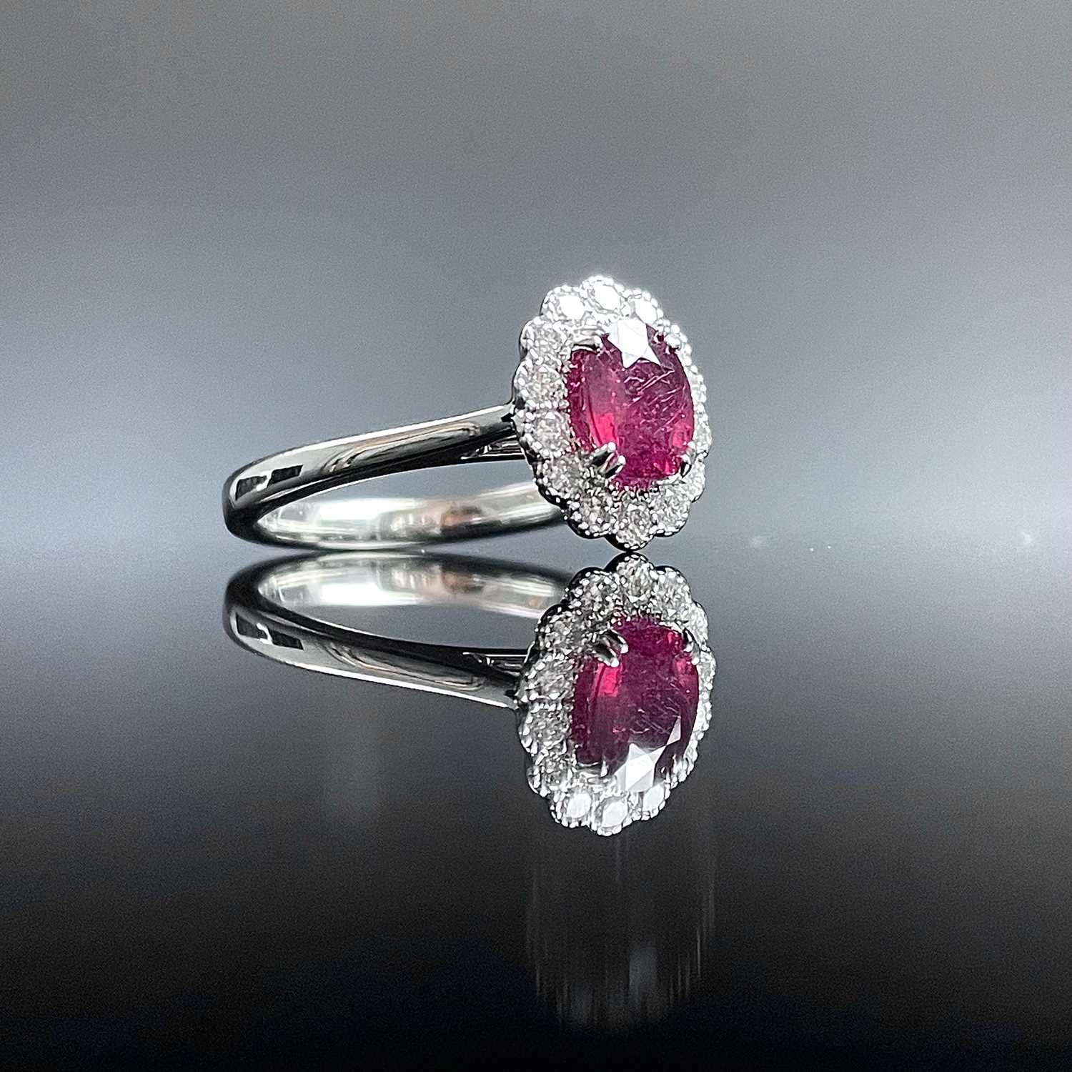Lot 614 - An attractive 18ct white gold Burmese ruby and...