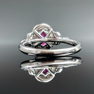 Lot 701 - A modern 18ct white gold, ruby and diamond...
