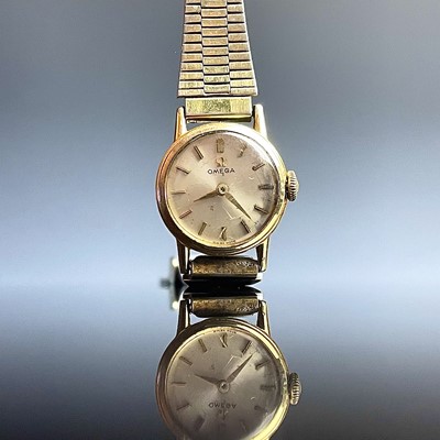 Lot 960 - A ladies Omega gold plated manual wind wrist...