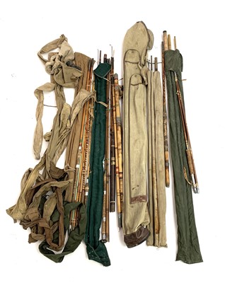 Lot 258 - A collection of various vintage fishing rods,...