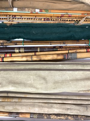 Lot 258 - A collection of various vintage fishing rods