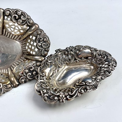 Lot 81 - A pair of Edwardian silver foliate scroll and...
