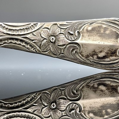 Lot 83 - A George I silver berry spoon, with deeply...