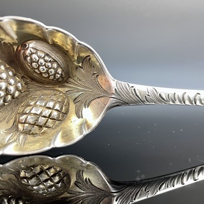 Lot 83 - A George I silver berry spoon, with deeply...