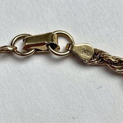 Lot 628 - A 9ct gold rope twist bracelet, stamped 375,...