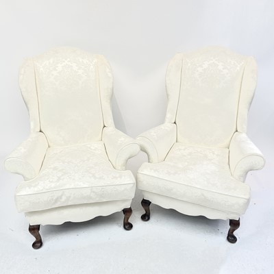 Lot 3037 - A fine pair of Georgian style wingback...