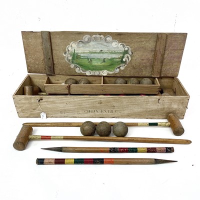 Lot 253 - A croquet set in a wooden crate the lid...