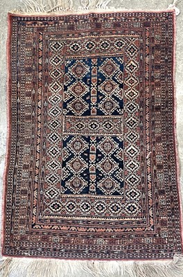 Lot 1219 - An Afghan rug, circa 1930, the indigo...