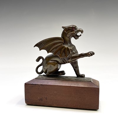 Lot 39 - A bronze figure of a wyvern, with inset eyes...