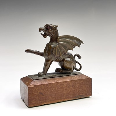 Lot 39 - A bronze figure of a wyvern, with inset eyes...