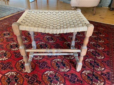 Lot 365 - An oak stool with rush seat, early 20th century.