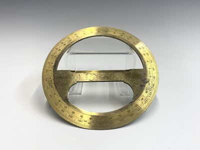 Lot 205 - A late 19th century brass circular protractor...