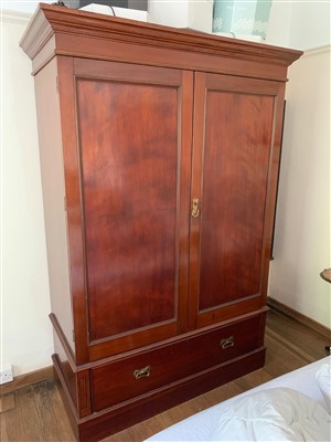 Lot 347 - An Edwardian mahogany gentleman's wardrobe,...