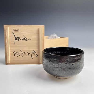 Lot 174 - A Japanese Raku-yaki ware chawan, signed, late...