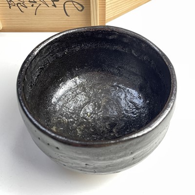 Lot 174 - A Japanese Raku-yaki ware chawan, signed, late...
