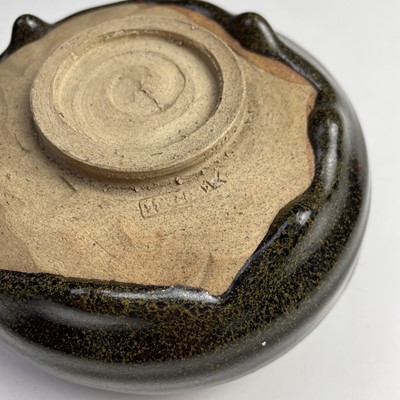 Lot 178 - A Japanese brown glazed stoneware tea bowl,...