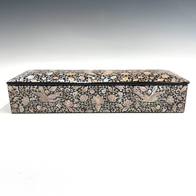 Lot 179 - A Japanese black laquered rectangular box and...
