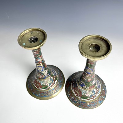 Lot 167 - A pair of Chinese brass champleve candlesticks,...
