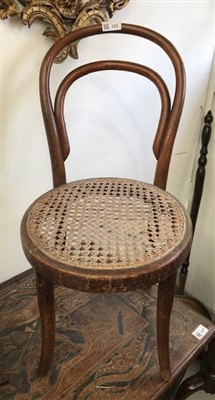 Lot 329 - A bentwood child's chairs with rattan seat.