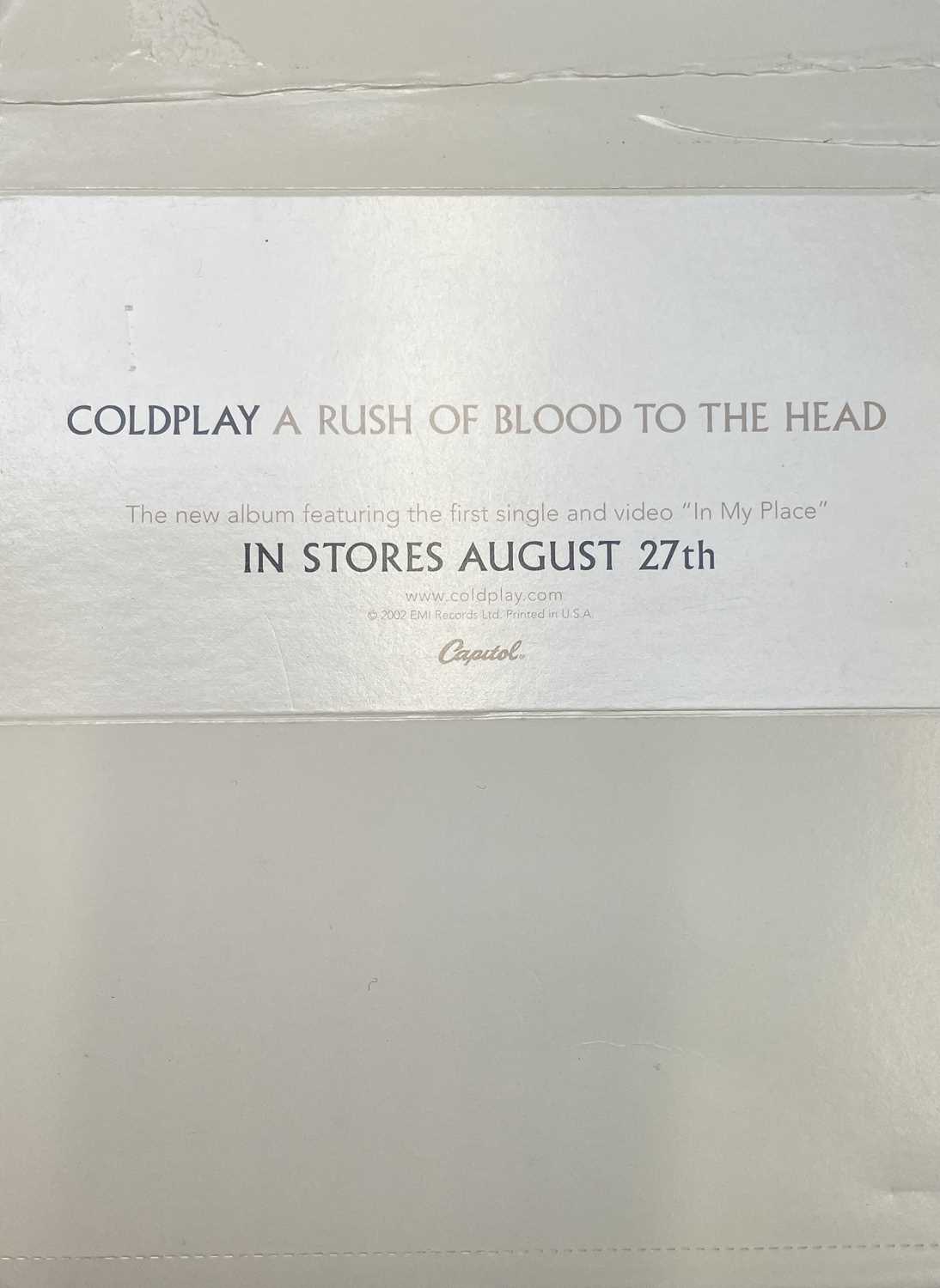 Lot 942 - Coldplay Autograph. An advertising display