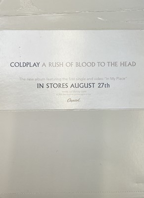 Lot 942 - Coldplay Autograph. An advertising display...