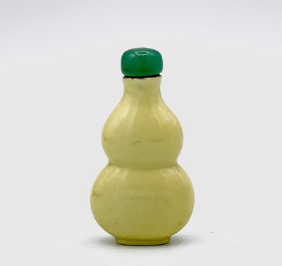 Lot 184 - A Chinese yellow glazed porcelain double gourd...