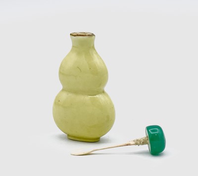 Lot 184 - A Chinese yellow glazed porcelain double gourd...