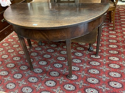 Lot 326 - A George II style mahogany demi lune tea table.