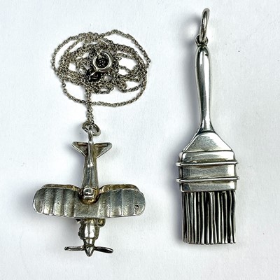 Lot 788 - A heavy silver novelty pendant modelled as a...