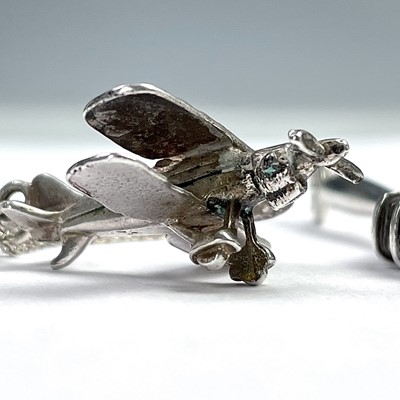 Lot 788 - A heavy silver novelty pendant modelled as a...