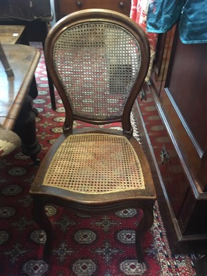 Lot 325 - Four French walnut side chairs, with rattan...