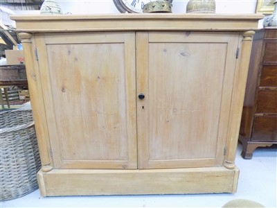 Lot 318 - A late Victorian pine cupboard, with a pair of...