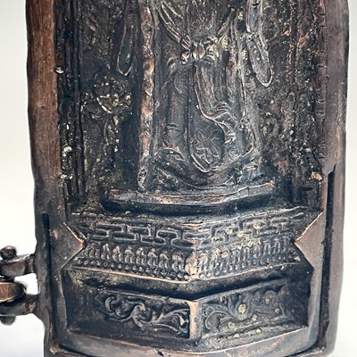 Lot 311 - An Eastern bronze triptych portable shrine,...