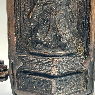 Lot 311 - An Eastern bronze triptych portable shrine,...