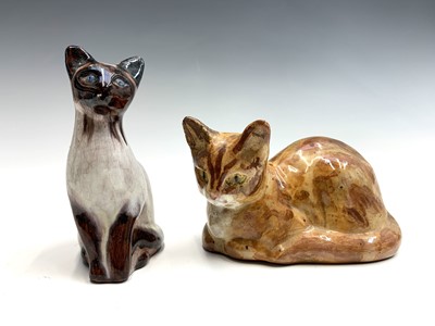 Lot 873 - Two studio pottery cats, signed Peyman, four...