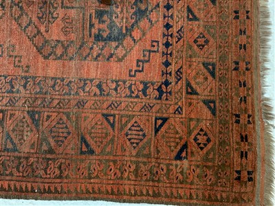 Lot 307 - An Afghan carpet with six rows of three...