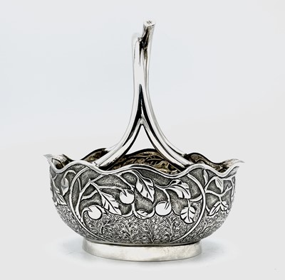 Lot 1024 - An Indian sterling silver basket, engraved on...