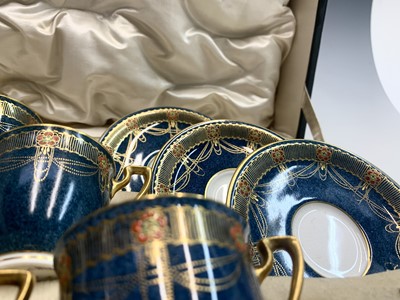 Lot 973 - A Royal Worcester cased porcelain coffee set...