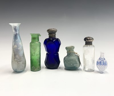 Lot 972 - An antique miniature glass medicine bottle,...