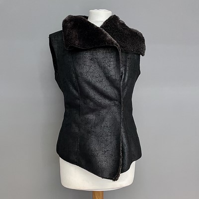 Lot 1035 - A Marc Cain faux leather and fur waistcoat,...