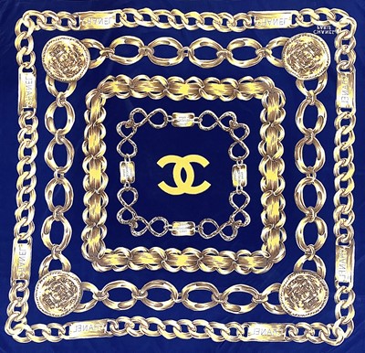 Lot 1030 - A Chanel printed silk scarf, 87cm square.