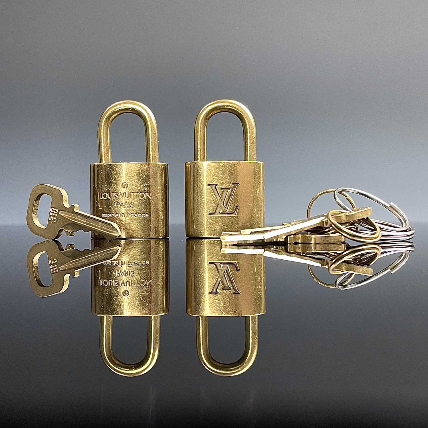 Lot - Vintage Louis Vuitton Lock and Key Necklace