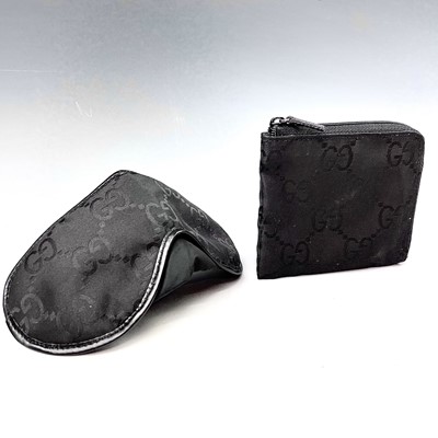 Lot 1012 - A Gucci eye mask within bag.