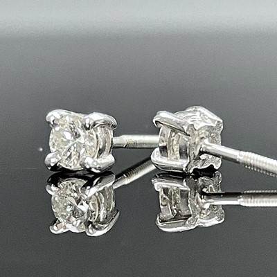 Lot 790 - A pair of white gold diamond set single stone...