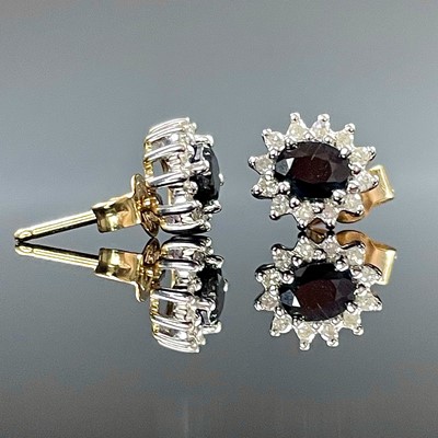 Lot 706 - A pair of 9ct hallmarked gold diamond and...