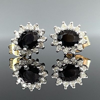 Lot 706 - A pair of 9ct hallmarked gold diamond and...